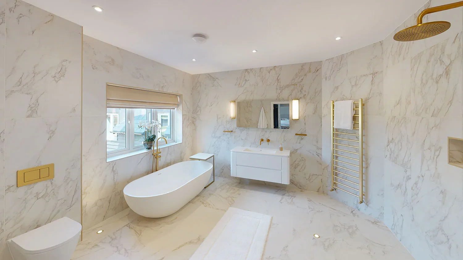 a bathroom with a tub, sink, and toilet